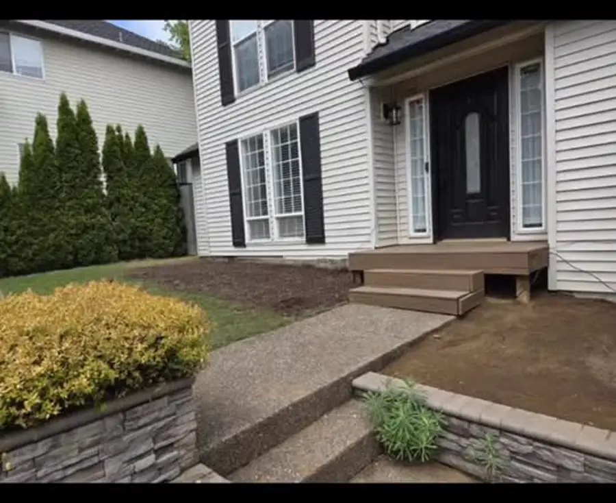 Residential entry and custom wood structure published by Red Road Roofing
